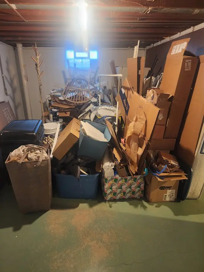 Roll-off dumpster container at job site for 15 Yard Dumpster Rental in Vero Beach